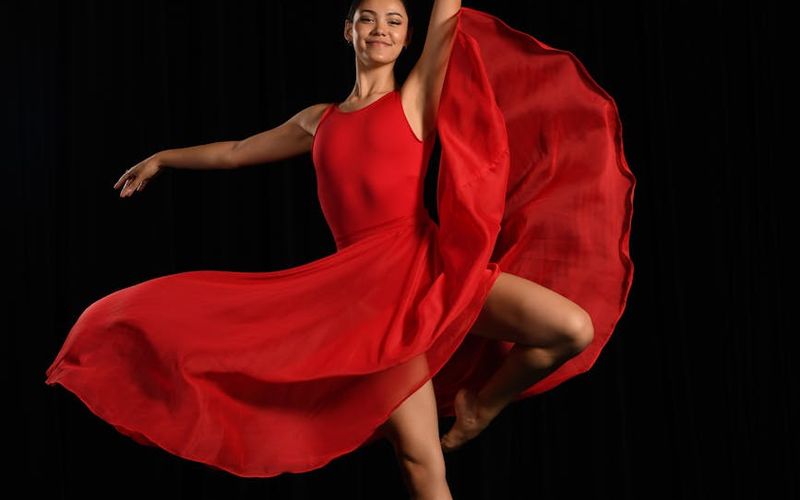 A person captured in a dynamic, flowing movement.